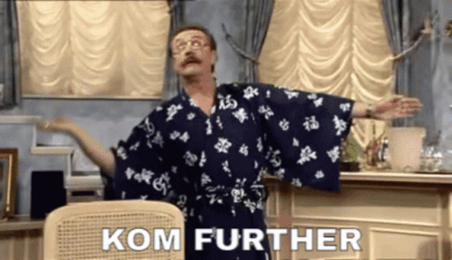Kom further