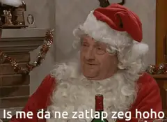 Nandje als kerstman aan tafel met bier