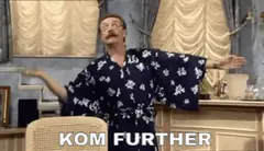 Kom further