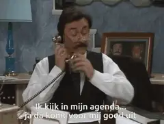 Boma bezet aan de telefoon, druk